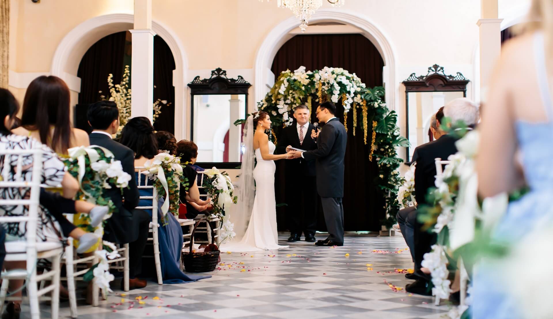 Sugar & Spice Events - Exchanging Vow during wedding ceremony at Suffolk House 